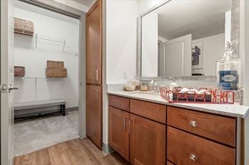 Bathroom with mirror and sink